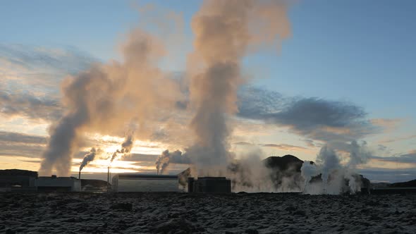 Iceland, Aerial view of Geothermal Power Plant with steamed pipes alt