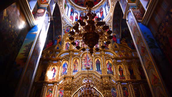 Chandelier golden decorations and paint of interior baroque church cathedral, Kiev Pechersk Lavra, K alt