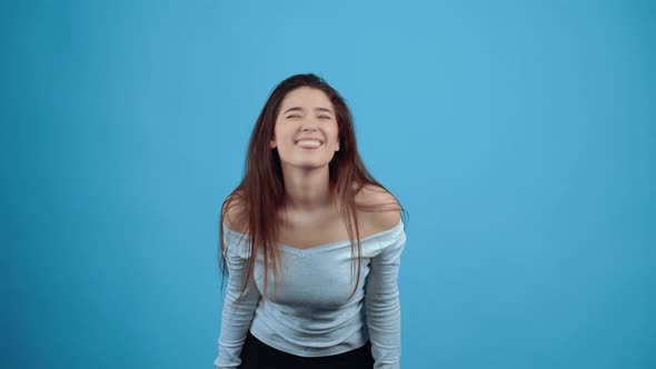 The Cheerful and Charismatic Face Shows a Playful Tongue and Displays a Wide Smile alt