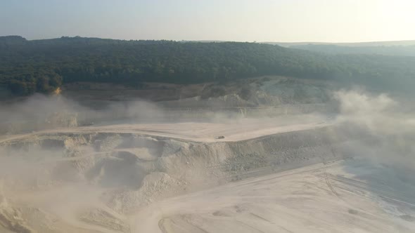 Aerial View of Open Pit Mining of Limestone Materials for Construction Industry with Excavators and alt