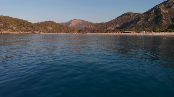 Blue Lagoon and Belcekiz Beach at the Foot of Babadag Mountain in Oludeniz Village Turkey alt