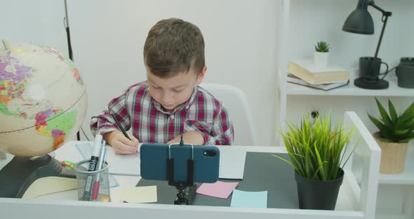 Child Kid School Boy Distance Learning Class Using Mobile Application Watching Online Tutoring alt