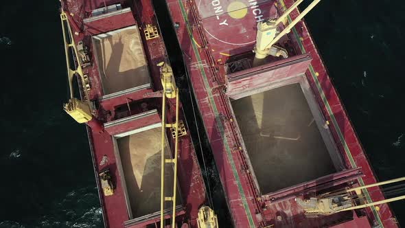Top View Bulk Carrier Deck and Barge Filled with Coarse Grain Soybean or Wheat alt