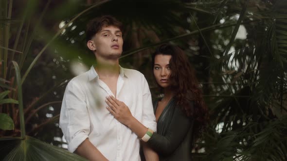 Romantic Couple in Love Standing in the Tropical Jungle alt