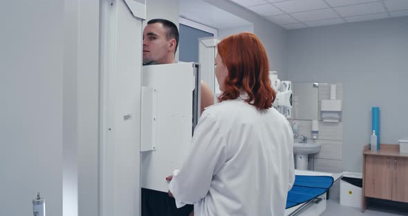 Patient and Doctor During Chest X Ray in Clinic alt