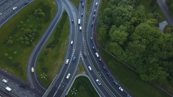 Aerial View Flying Over of Loaded Cars with Traffic Jam at Rush Hour on Highway with Bridge