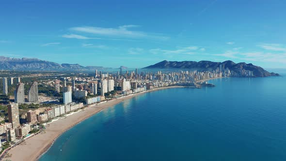 Spanish City Benidorm Buildings and Sandy Beach Poniente. Aerial View. alt