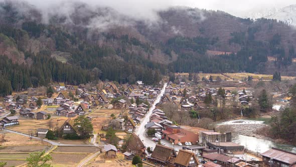 Time lapse of Traditional cottage houses in Shirakawago village with mountain hills alt