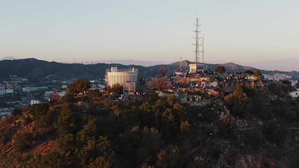 Visitors Enjoy Panorama of Barcelona From Turo De La Rovira alt