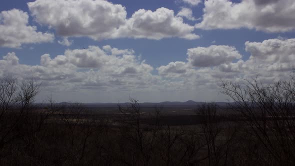 Clouds moving fast in the Caatinga dead arid and dry landscape in Quixada, Ceara, Brazil alt