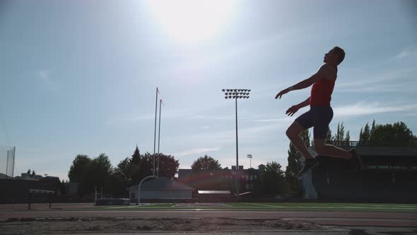 Track athlete doing long jump in super slow motion, shot on Phantom Flex 4K