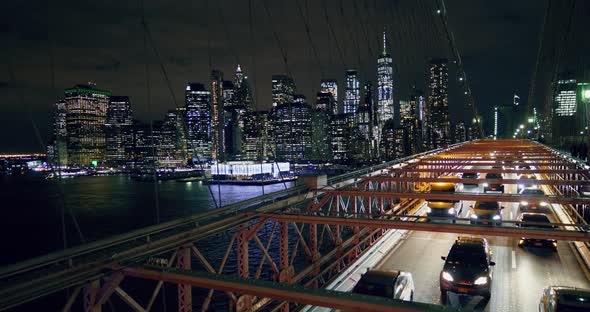 Cars Driving at Night on Brooklyn Bridge New York City