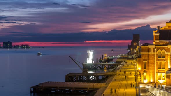 Elevated View of the Padrao Dos Descobrimentos Monument to the Discoveries Day to Night Timelapse alt