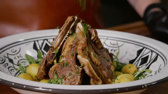 Cooked Lamb Ribs Seasoned with Parsley. alt