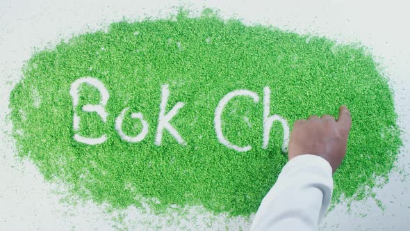 Hand Writes On Green Bok Choi