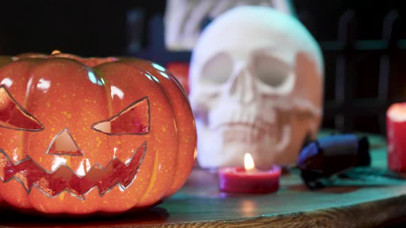 Close Up of Jackolantern Halloween Decoration on a Table alt