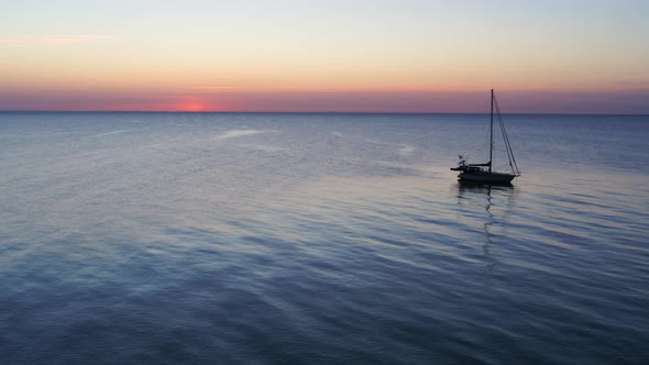 Drone Passing A Lonely, Small Sailboat At Sea, Drone Stock Footage By Drone Rune alt