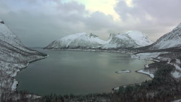 Winter Fjord in Norway and Dramatic Sky