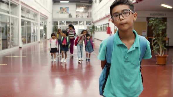 Funny Boy in Eyeglasses Going to Class Reluctantly alt