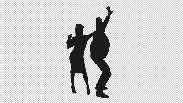 Silhouette of Two Funny Colleagues in Santa Hats Dancing While Celebrating Christmas