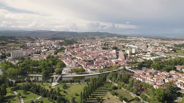 Chaves city and Tamega river in Portugal. Aerial circling alt