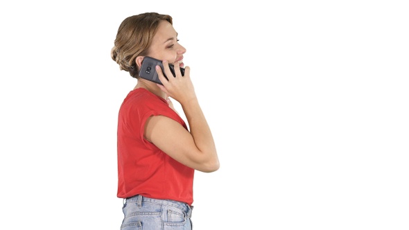 Blonde Woman Walking and Talking on The Phone on White Background alt