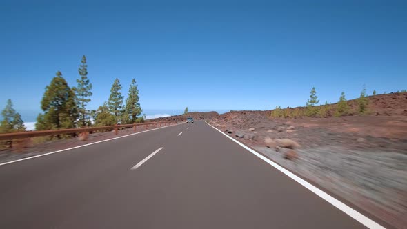 Driving a car with attached action cam in Teide National Park Tenerife alt