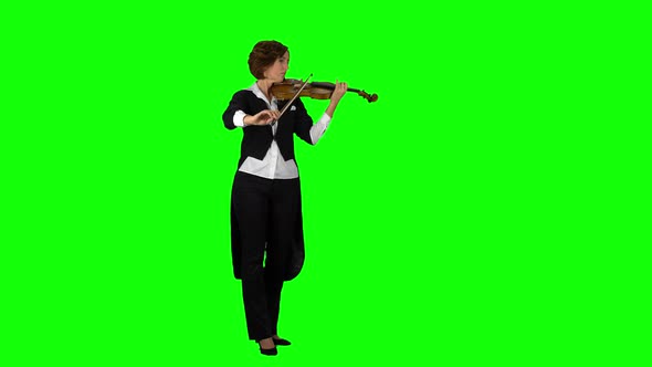 Girl in the Jacket Plays the Violin. Green Screen alt