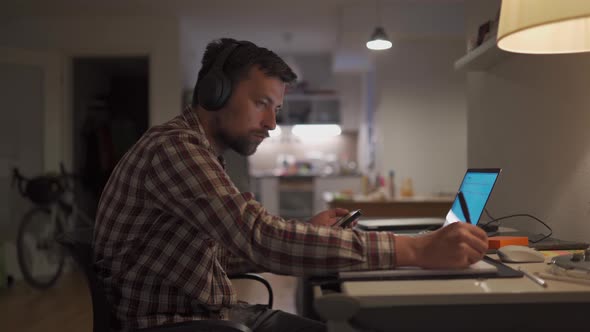 Student Communicates Online with Teacher Uses Headphones and Laptop at Home Writes Notes Prepares alt