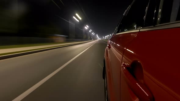 Drivelapse Urban Look From Fast Driving Car at a Night Avenue in a City Timelapse Hyperlapse alt