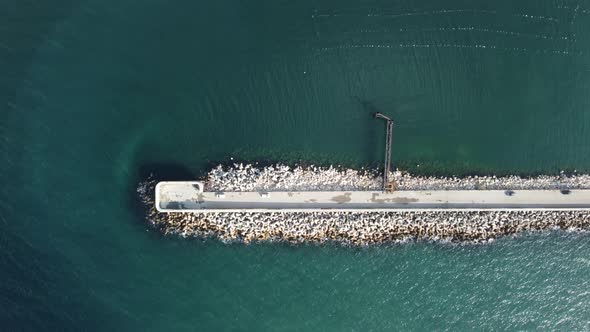 Aerial Drone View of a Breakwater alt