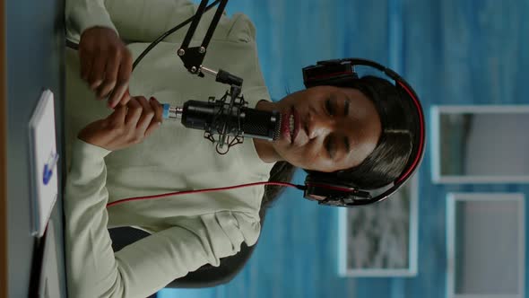 Vertical Video Famous Young African Woman Recording a Vlog for Subscribers alt