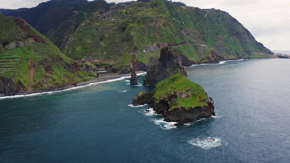 Flying Around Ribeira Da Janela Volcanic Sea Stacks in Madeira Island Portugal alt