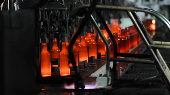 Manufacturing Industrial Factory with Automated Line for Production of Bottles. alt