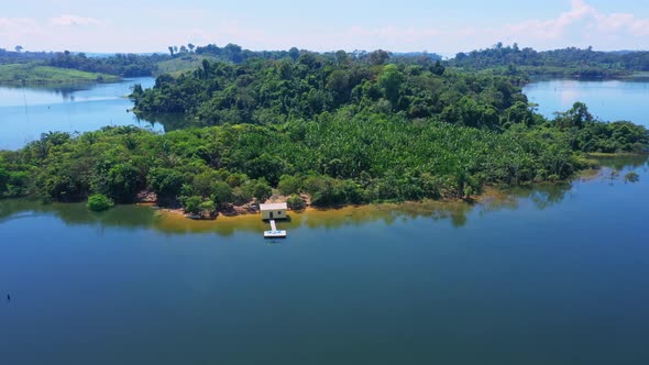 Drone Image Of An Island Surrounded By Blue Water