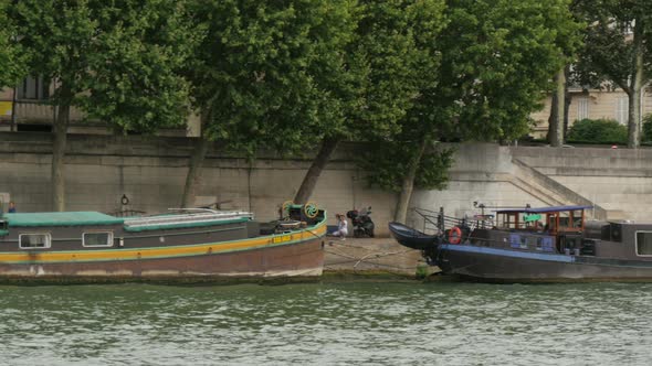 Moored boats on Seine River alt