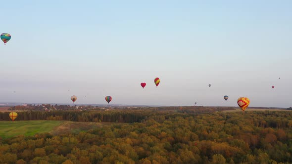 Hot Air Balloons in Sky at Sunset alt