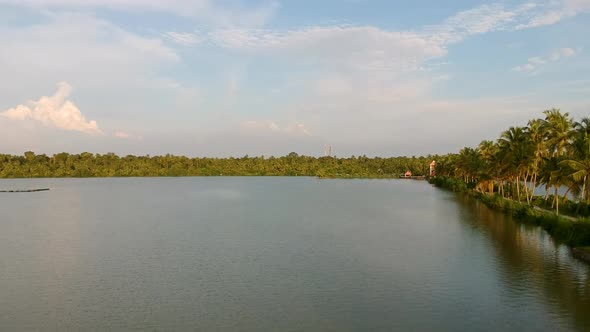 Vembanad lake fish farm,aerial shot,coconut tree lines alt