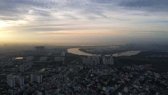 Aerial view overlooking the Binh Khanh and the Saigon river, foggy, sunset in Ho chi minh, Vietnam - alt