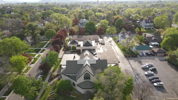 Aerial view of church property in La Crosse, Wisconsin. Sunny sky with reflections.