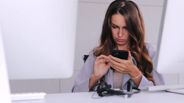 Businesswoman browsing internet on smartphones