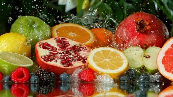 Super Slow Motion Shot of Splashing Water on Variation of Fruits at 1000Fps alt
