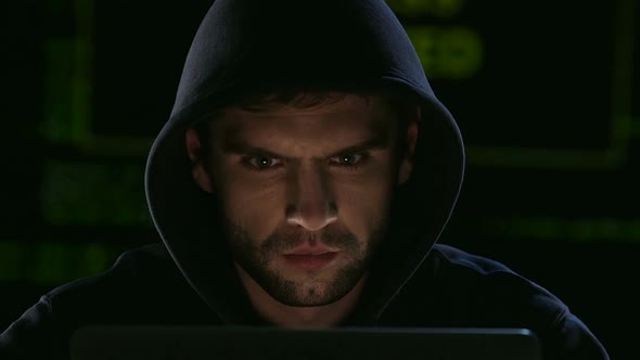 Hacker in Hood Illegally Hacking Site Selecting Passwords, Access Is Allowed alt