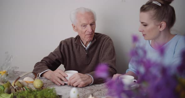 Woman Spending Time with Grandfather alt