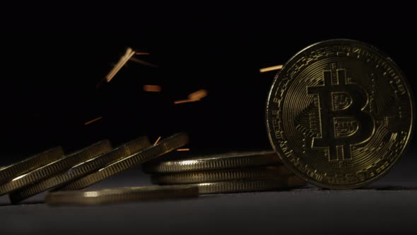 Cryptocurrency on the block chain - close up of bitcoin altcoin physical coins in dynamic setting alt