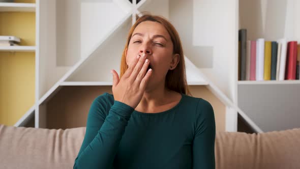 Tired Woman Yawning Want To Sleep Cover Mouth with Hand at Home alt