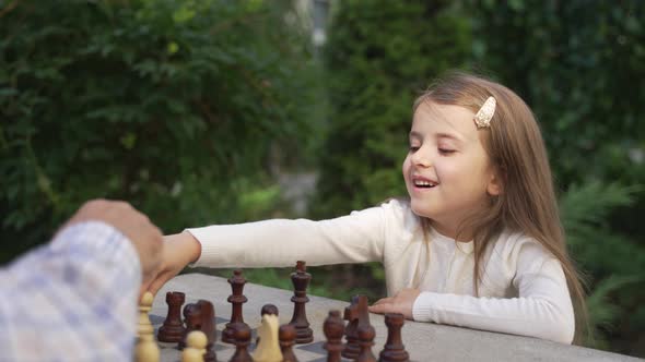 Portrait Smiling Little Girl Chess Player Playing alt