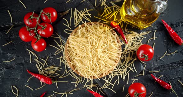 Pasta Dry Vermicelli with Tomatoes and Oil Slowly Rotating alt