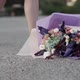 Closeup of Flower Lying on Asphalt As Slim Ballerina in Yellow Pointes Hitting Bouquet Away - VideoHive Item for Sale