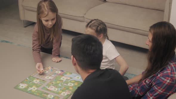 Family spends time playing board games